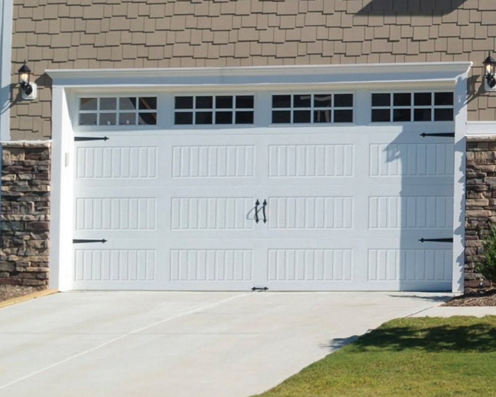 white garage door of residential home belle mo